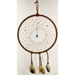 A large brown wrapped dream catcher with turquoise beads, and a turquoise chunk as the centerpiece, draped with feathers and quartz crystals.