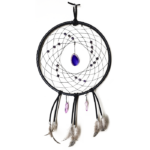 A black dream catcher showing a purple agate slice as the centerpiece, surrounded by amethyst beads woven into the dream catcher, and purple quarts crystals and feathers hanging bellow.