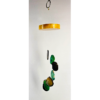 An agate windchime with a polished wood base strung with black and green agate slices.