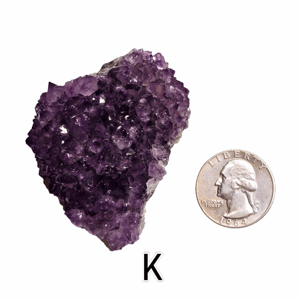 Amethyst cluster 'K' with a quarter for comparison.