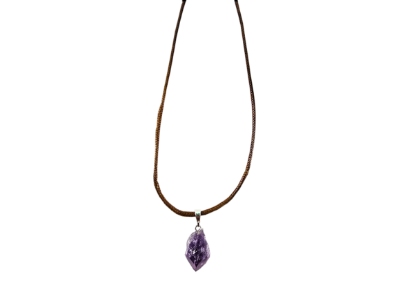 A shot of an amethyst point pendant including the wax cord adjustable necklace it comes with.