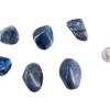 Large tumbled blue quartz stone in soft shades of sky blue with subtle marbling, shown next to a quarter for size comparison, the stones are larger than the quarter.