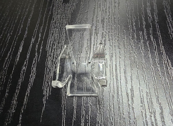 A small acrylic slab display stand.