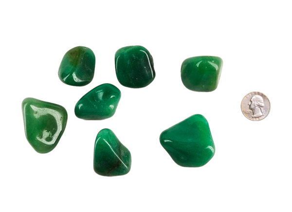 Alt text: Large tumbled Green Aventurine stones with smooth, polished surfaces and natural green hues, displayed on a neutral background.