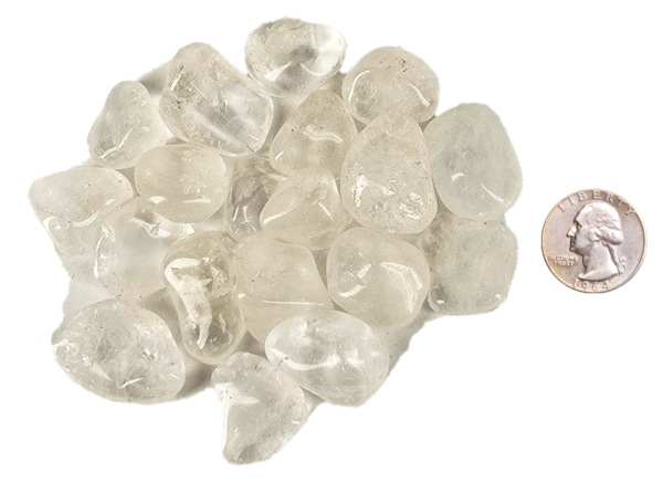 A pile of small quartz tumbled stones, that are mostly transparent with some inclusions, with a quarter for comparison. Most are slightly smaller than the quarter.