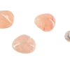 A group of three extra large rose quartz with deep pink hues, with a quarter for comparison. These stones are about 4 times the size of the quarter.