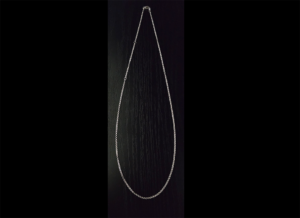 A sterling silver adjustable necklace showing the full necklace.