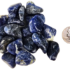 A pile of small sodalite tumbled stones, showing deep blues and a range of milky to creamy white patterns with a quarter for comparison. Most are slightly smaller than the quarter.