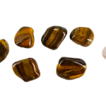 Large A Grade Tiger's Eye tumbled stones with smooth, polished surfaces showcasing rich golden-brown hues and a captivating chatoyancy shimmer, compared to the size of a quarter, it is larger.