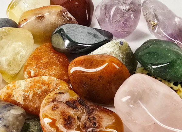 A closup of pile of tumbled mix with a range of small stones.