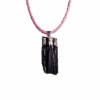 Black Tourmaline silver plated cap and bail pendant with pink wax cord adjustable necklace with white background.