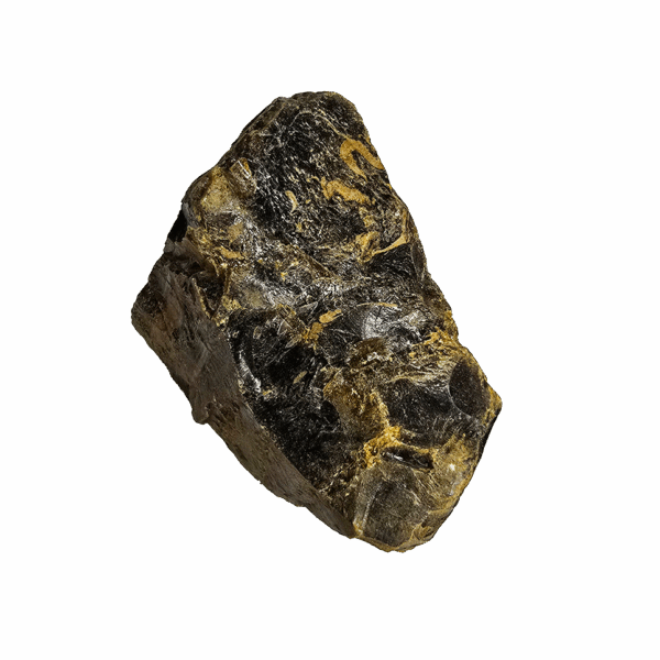 A closeup of a chunk of golden brown Indonesian Amber.