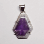 Atomic amethyst pendant with sterling silver posts securing stone, and a bail.